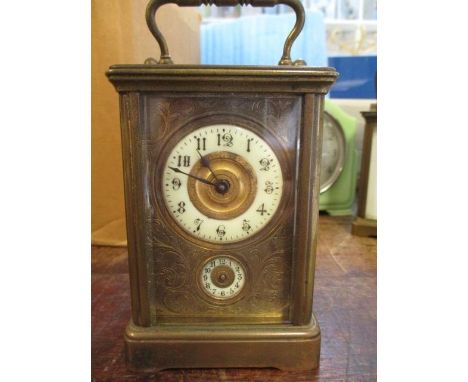 A late 19th century brass cased carriage alarm clock, 4 1/2"h 