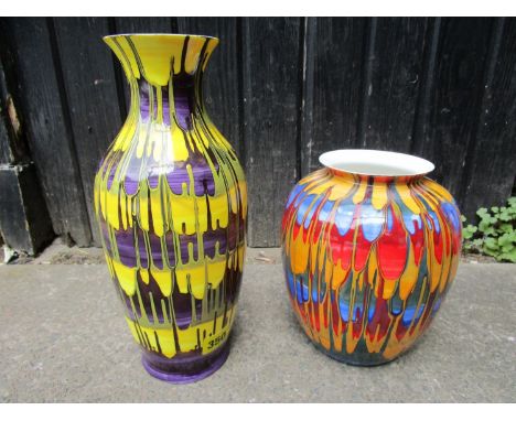 Two Brian Wood Monhague ceramic vases, drip and combed decoration, signed L Oakley to base 