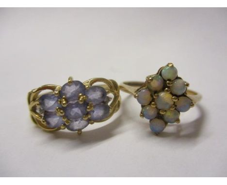 A 1.9ct tanzanite ring and a 9ct gold opal ring 