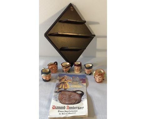 Royal Doulton Diamond Anniversary Tinies jug collection with display shelf.