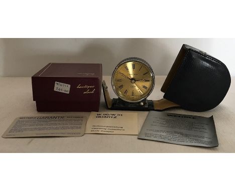 Wehrle Club quartz travel clock in blue leather case. Unused retail boxed. Clock approx 6.5cms t. 