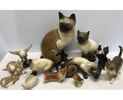 Eleven various ceramic animals including cats, some a/f, dog, swan, Beswick bird a/f to tail.