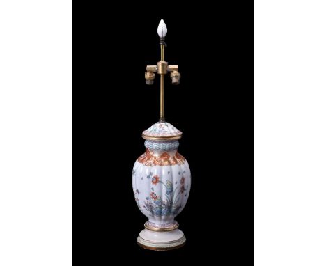 A modern Continental porcelain gadrooned ovoid lamp base, decorated in a kakiemon manner and the 18th century French St. Clou