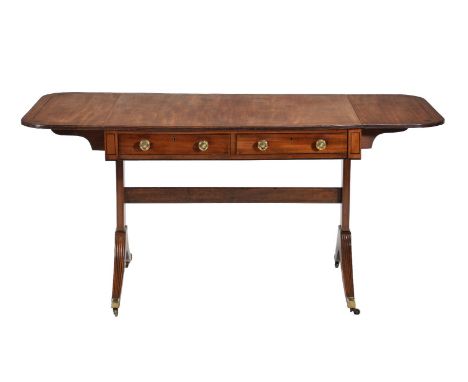 ϒA Regency mahogany and ebony strung sofa table, circa 1820, in the manner of George Bullock, 72cm high, 71cm deep, 150cm wid