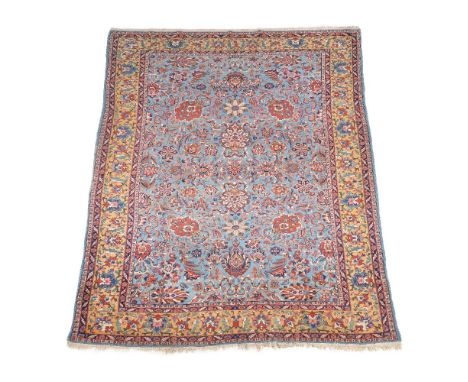 A Tabriz carpet, of overall design, approximately 313 x 205cm