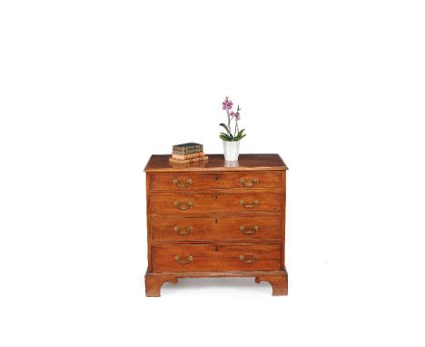 A George III mahogany chest of drawers, circa 1770, with shaped bracket feet incorporating unusual scroll terminals, 79cm hig