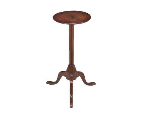A mahogany and fruitwood tripod candle stand, late 18th/ early 19th century, 69cm high, the top 30cm diameter