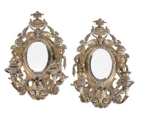 A pair of Continental, possibly Italian, gilt metal twin light girandoles, in 18th century taste, last quarter 19th century, 