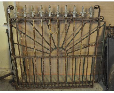Two wrought iron garden gates, one with fleur-de-lis design. (2)(B.P. 21% + VAT) 