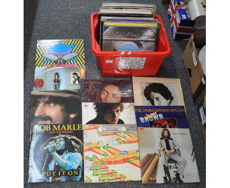 Box containing 53 vinyl records including Bob Dylan, Al Stuart, Bob Marley and the Wailers, Eric Clapton, The Incredible Jimm
