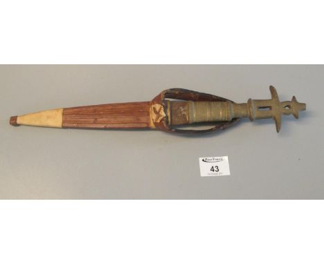 North African style steel bladed dagger with cast metal hilt and leather scabbard. (B.P. 21% + VAT) These items cannot be pos