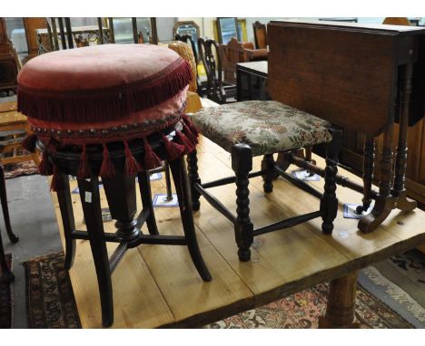 Edwardian mahogany Sutherland table, together with a late Victorian swivel piano stool, and an early 20th century bobbin turn