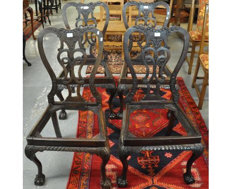 Set of four Chippendale style dining chairs on cabriole legs and ball and claw feet ( drop in seats are missing). (4)(B.P. 21