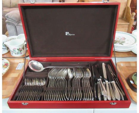 Wooden boxed canteen of cutlery marked Guy Degrenne containing; forks, spoons, teaspoons, ladle, knives etc. (B.P. 21% + VAT)