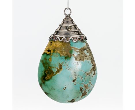 A 'Jade' style silver mounted pendant.