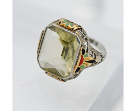 An enamel and gold gem stone ring, size H.