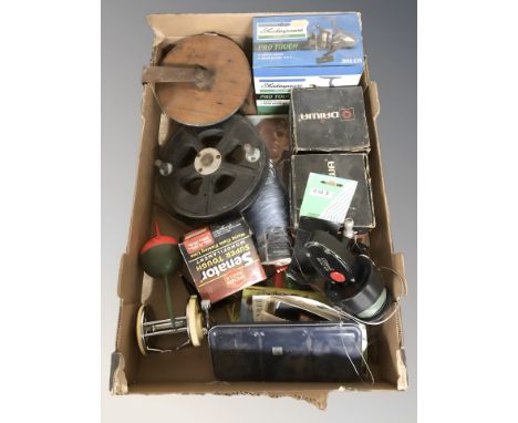 Vintage and modern fishing reels including Shakespeare, further fishing equipment including line, float, hooks, etc. (1 box)