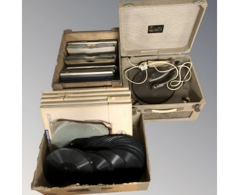 A Trixette gramophone and a quantity of records.
