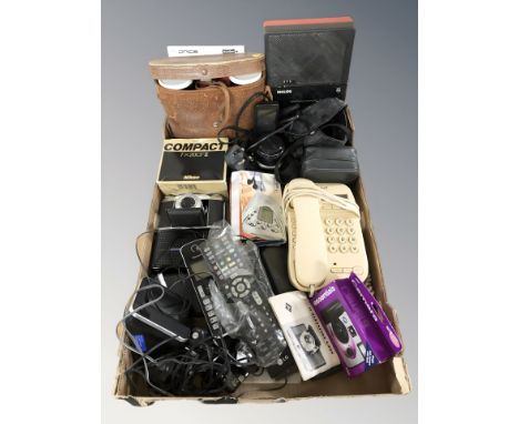 A group of binoculars, Pentax and other cameras, vintage telephones, Philips tape recorder, etc. (1 box)