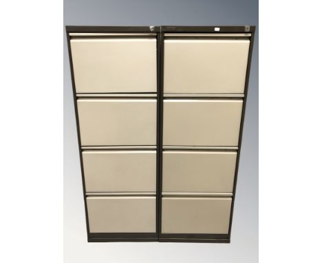 A pair of Triumph four drawer enameled metal filing cabinets, width 46 cm.