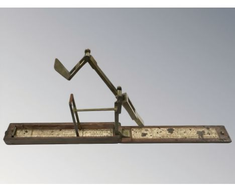 An 18th century guinea scale by A Wilkinson, Ormskirk, Lancashire, length 26cm