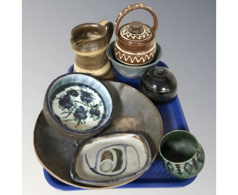 A group of Scandinavian studio pottery bowls and dishes, slip glazed jar and cover, etc.