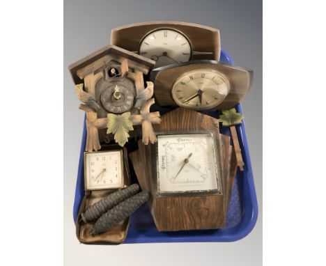 A cuckoo clock, barometer, two Metamec mantel clocks and a Smith's alarm timepiece.
