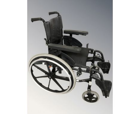A folding wheelchair.