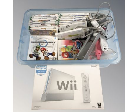 A Nintendo Wii console, controllers, games, etc. (1 box)
