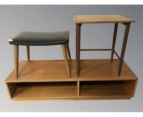 A teak low entertainment stand, width 117 cm, a stool and an occasional table. 