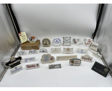 Large Assortment of Ceramic and other Name Stands.