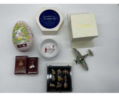 Assorted Lot to include 925 Silver Steiff Bear, NAO Rabbit, Hidden Treasures, and others. 
Good condition, no damage. 