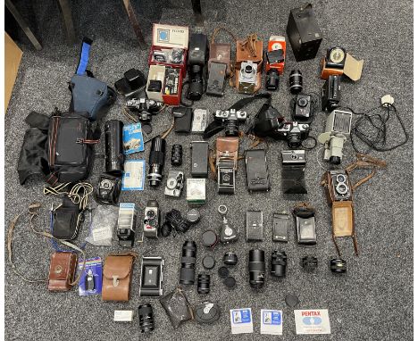 Large Collection of Vintage Cameras and Accessories to include Minolta, Canon, Praktica, Zenit and others. 