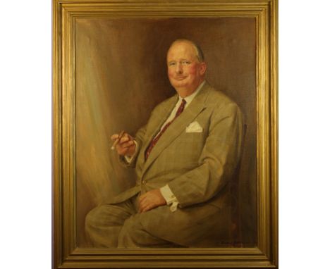 Denis Fildes (1889-1974). An Oil on Canvas: Three-quarter Length Portrait of John Waudby wearing a grey checked suit and red 