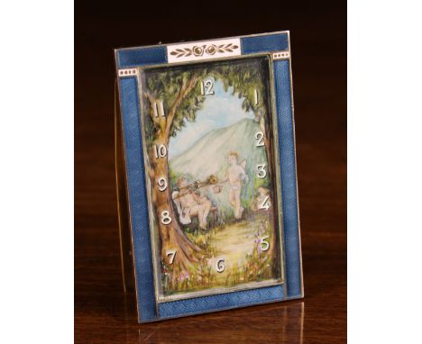 A Small Gilt Metal Travelling Clock on Easel Stand. The rectangular dial painted with two winged cherubs in woodland within a