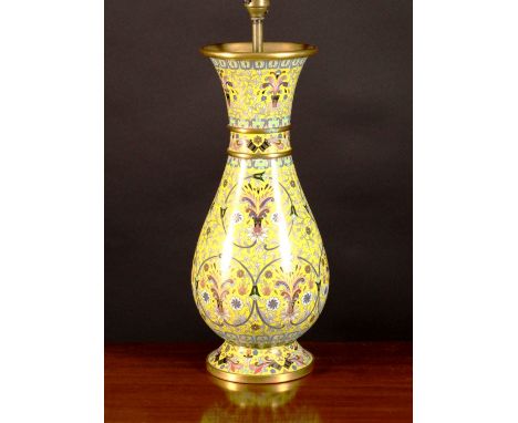 An Attractive Yellow Ground Cloisonné Lamp of baluster form decorated with scrolling foliage and flowers, 26 ins (66 cms) ove