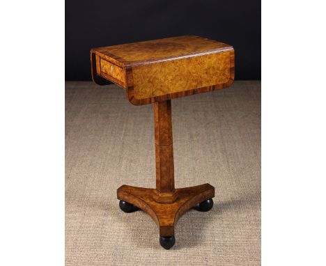 A Superb Quality Regency Period Burr Elm Pedestal Pembroke Table of beautiful glowing colour & patination.  The top having a 