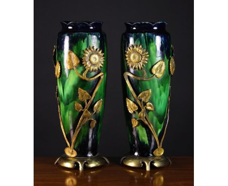 A Pair of Tall Art Nouveau Majolica Vases with gilt metal mounts, by Josef Strnact. The bodies having petalled rims and strea