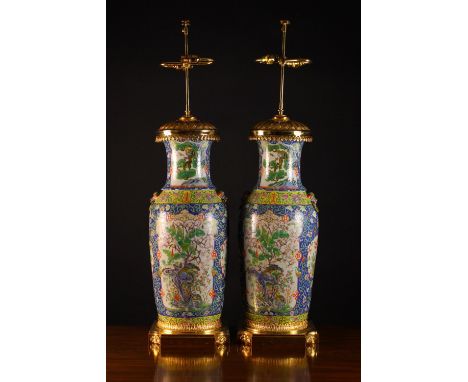 A Pair of Large Cantonese Vase Lamps painted in polychrome enamels with scenic panels depicting birds and landscape in a coba