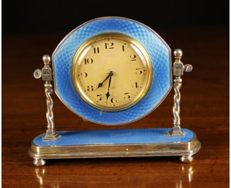 A Small Art Deco Silver & Enamel Clock hallmarked London 1928 with Collett & Anderson makers' punch. The Swiss made eight day