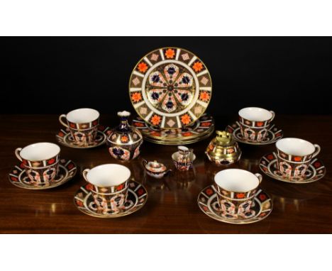 A Collection of Royal Crown Derby Bone China decorated in the Imari palette and comprising of six cups & saucers five plates,