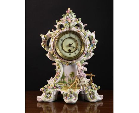 A Late 19th Century Continental Porcelain Mantel Clock. The scrolling case crested with foliate sprays and encrusted with flo