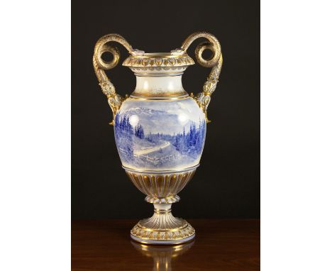 A Large Swedish Rörstrand Lavender Blue & White Pedestal Vase with gilt embellishments. The twin handles having acanthus moun