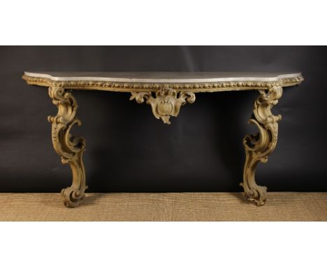 An Early 19th Century Louis XV Style Serpentine Console Table (A/F). The grey veined Carrara  marble top having a moulded edg