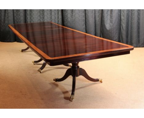A Fabulous Quality Mahogany Cross-banded Triple Pedestal Table of impressive proportions by Arthur Brett of Norwich. The dark