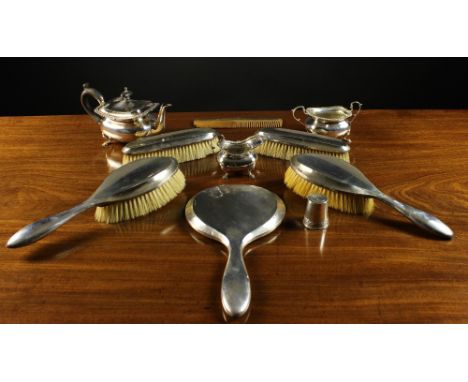 A Collection of Silver: A Small Victorian three part Teaset with Birmingham assay marks. An Art Deco Brush Set comprising of 