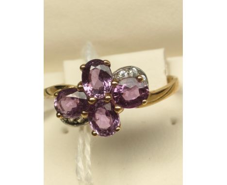 10ct yellow gold ladies ring set with gem stones. [Ring size P] [2.25Grams] 