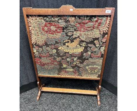 19th century oak framed screen, Removable tapestry section, Tapestry done in a colourful design [tribal] Depicting birds and 