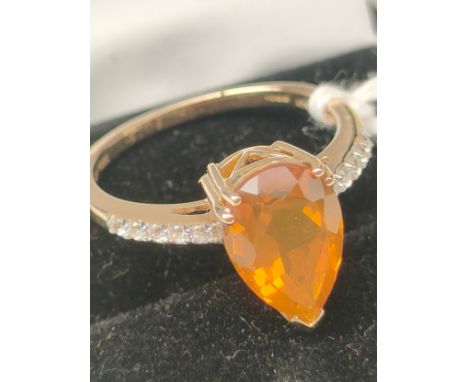 10ct yellow gold ladies ring set with gem stones. [Ring size P] [3grams] 