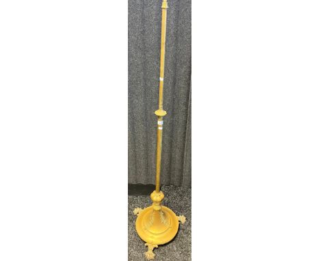 19th century rise and fall brass paraffin lamp stand, raised on a circular base ending in claw feet [160cm] 